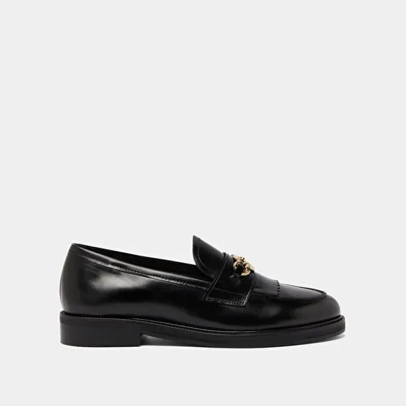 Loafers with gold buckles in black leather