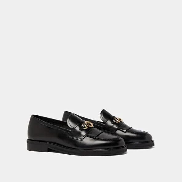 Loafers with gold buckles in black leather